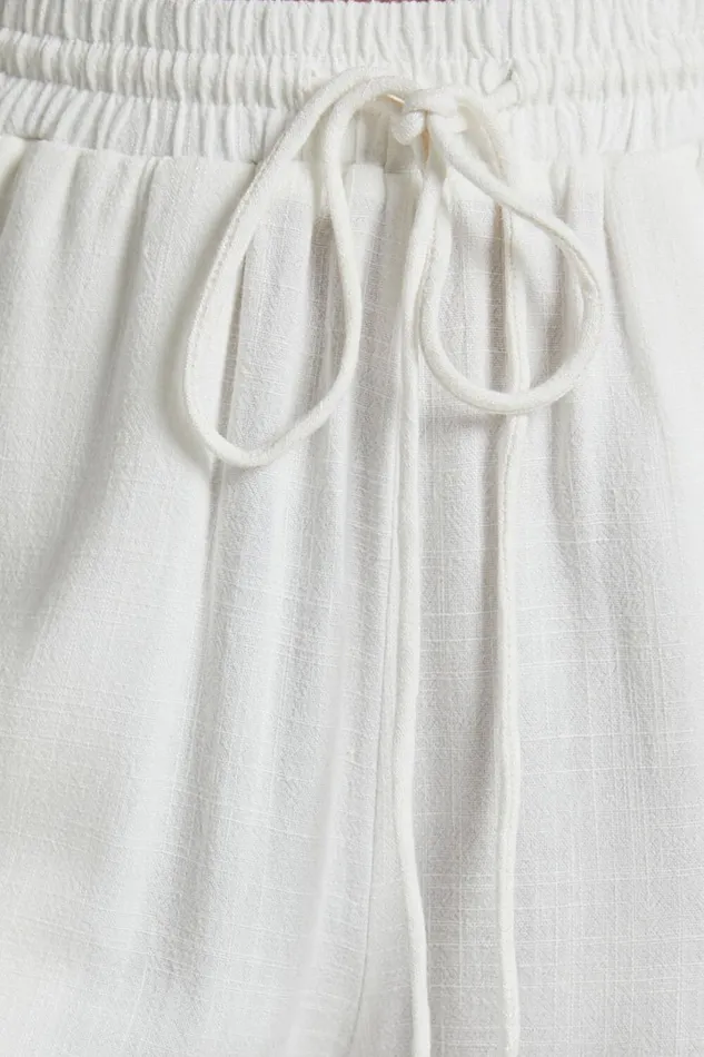 Kala Pants 8211 Mid Waisted Relaxed Elastic Waist Pants In White Women Showpo Pants