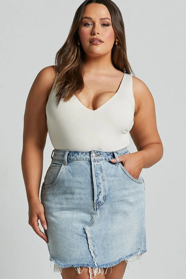 Pieta Mini Skirt 8211 Recycled Cotton Raw Hem Denim Skirt In Mid Blue Wash Women Showpo Curve Clothes