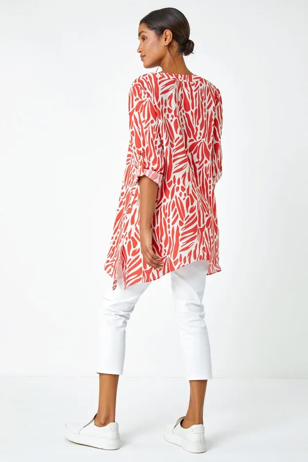 Women Orange Spot Print VNeck Hanky Hem Tunic Top Roman Tops